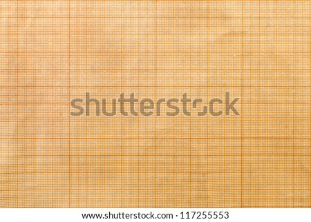 Closeup of orange graph paper texture.