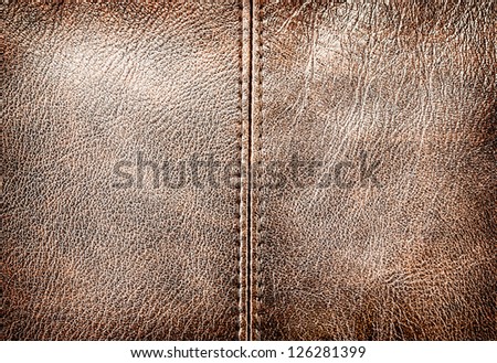 Closeup of leather texture with seam for art design.