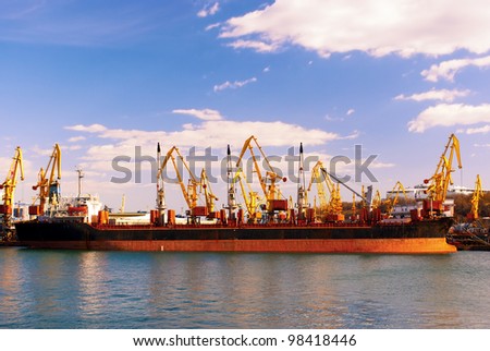 Industrial scene - moorage ship in a seaport .