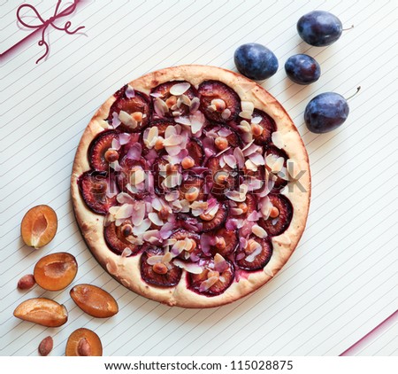 Fresh baked sweet plum cake and plums