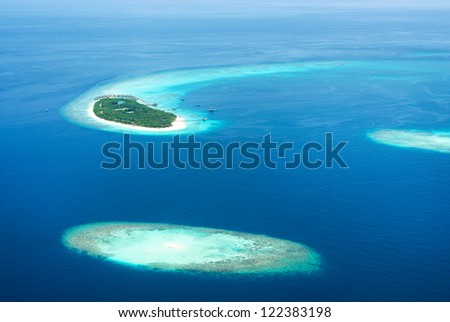 Tropical islands in Indian ocean from above, Maldives