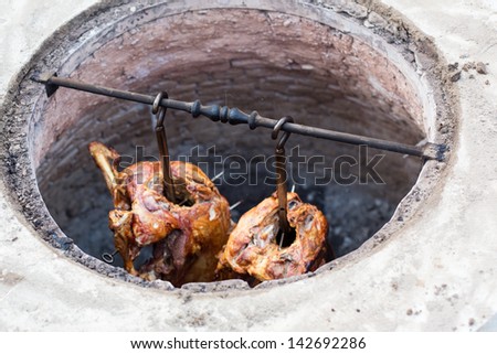 Grilled lamb meat made in earth oven, traditional turkish cuisine.