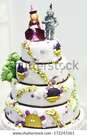Beautiful Wedding cake decorated with knight and princess for party