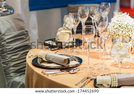 Elegant table set in soft creme for wedding or event party