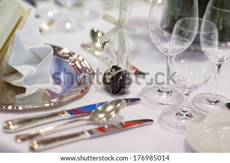 Beautiful elegant table set  for wedding or event party with groom pop cake
