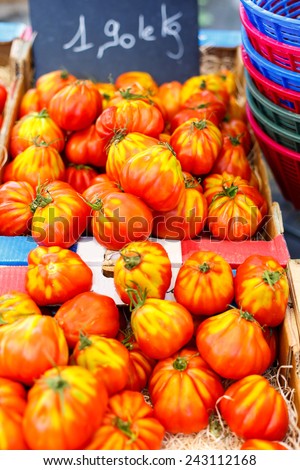 Organic fresh tomatoes from mediterranean farmers market. Healthy local food market.