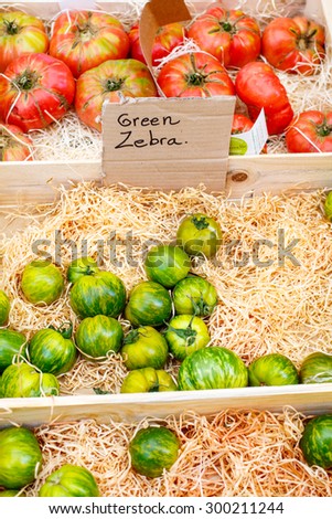 Organic fresh tomatoes from mediterranean farmers market. Healthy local food market.