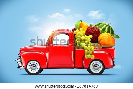 Pickup truck loaded by fruits.