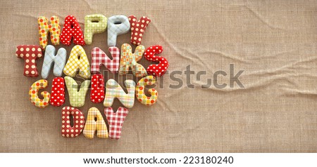Autumn Thanksgiving Day composition with handmade text on canvas background. Unusual thanksgiving day illustration. Top view