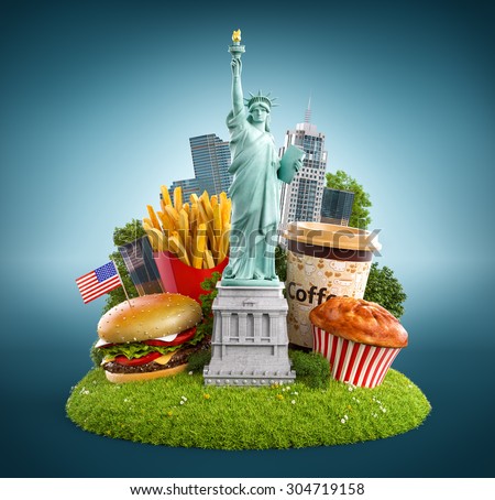 Statue of liberty and traditional american food on a grass meadow