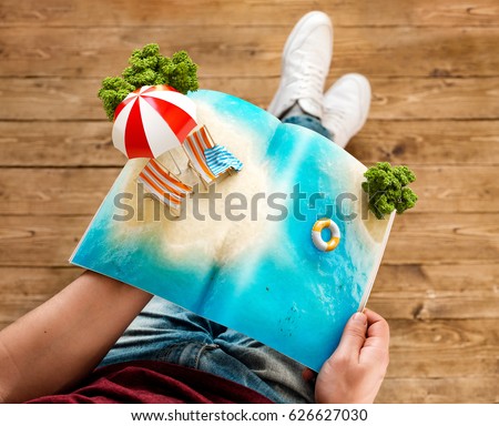 Tropical island with beach umbrella and deck chairs on a pages of opened magazine in hands. Unusual travel 3d illustration. Summer travel and vacation concept