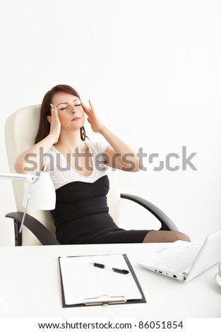 Tired business woman at office