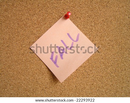 Orange small sticky note on an office cork bulletin board.