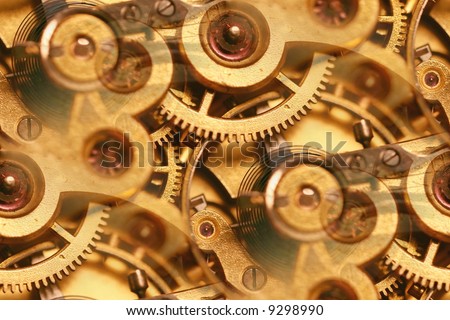 clockwork mechanism abstract; inner workings of an antique fob watch