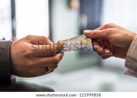 Close-up of credit card in humans hand
