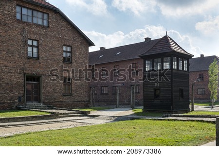 BRZEZINKA, POLAND - OCTOBER 13, 2012: Block of houses in concentration camp Auschwitz, Poland. It was the largest of the German concentration camps.