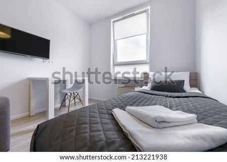 Sleeping bad in small, economic modern room in scandinavian style