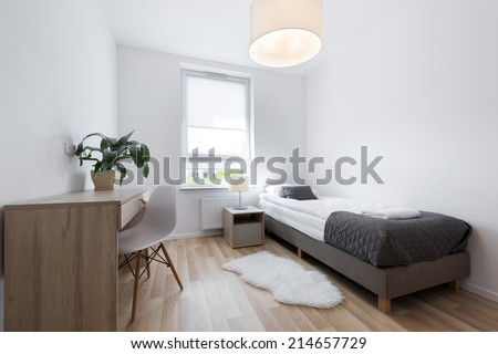 Small, modern sleeping room interior design in scandinavian style