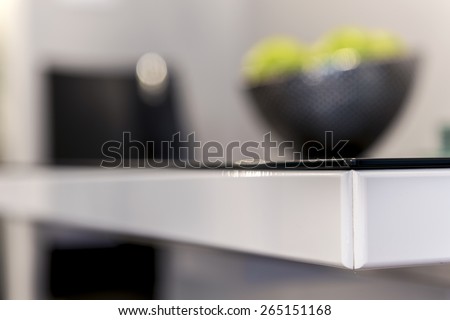 Corner detail of modern black and white table