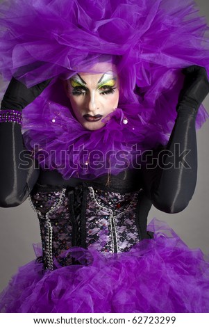 Drag Queen Daruma with violet dress, portrait