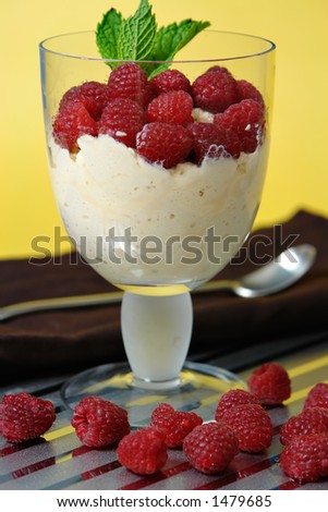 Raspberrys with whipped cream dessert