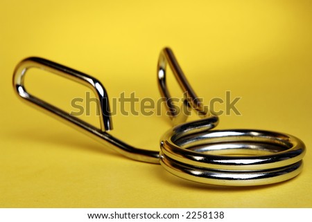 Hand Gripper on yellow background
