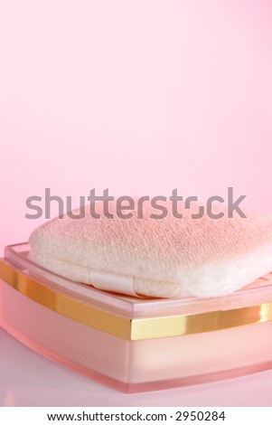 Cosmetic powder with pink cast