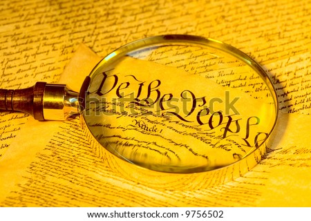 Magnifying glass and United States Constitution