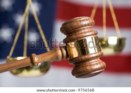 Gavel with American Flag and Justice of Scale in background