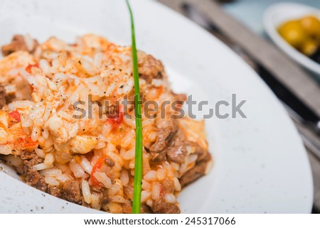 Traditional spanish dish rice with chicken seafood and meat