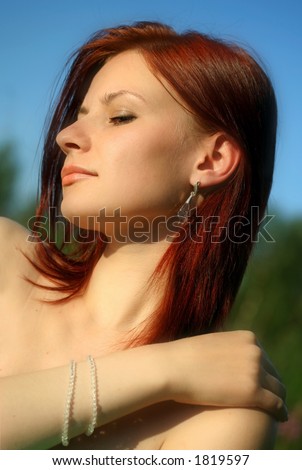 stock photo The nude naked woman with jeweller ornaments
