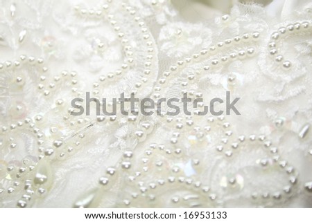stock photo white beaded wedding gown fabric