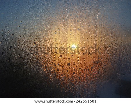 View of sunset trough frosted window