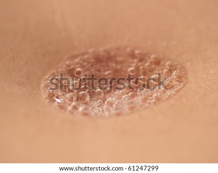 Water drop with air vials in a navel.