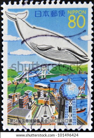 JAPAN - CIRCA 1993: A stamp printed in Japan shows Whale on the city, circa 1993