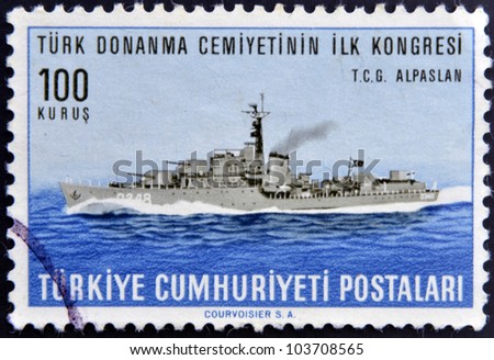 TURKEY - CIRCA 1965: A stamp printed in Turkey dedicated to First Congress of the marine community of turkey, shows T.C.G. Alpaslan, circa 1965