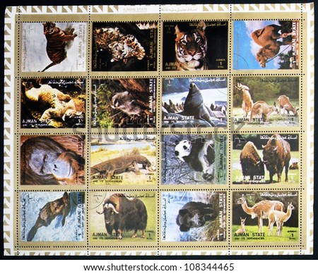 AJMAN- CIRCA 1972: A collection of sixteen stamps showing pictures of endangered animals, circa 1972