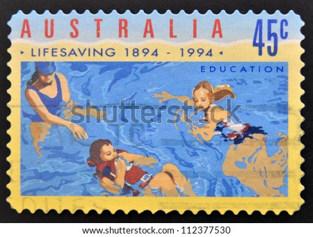AUSTRALIA - CIRCA 1994: A stamp printed in Australia shows lessons to teach swimming, circa 1994