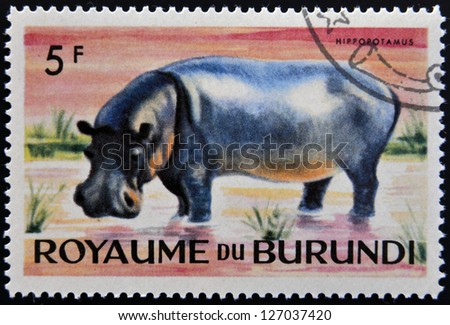 BURUNDI - CIRCA 1964: stamp printed in Kingdom of Burundi shows an African animal - Hippopotamus, circa 1964