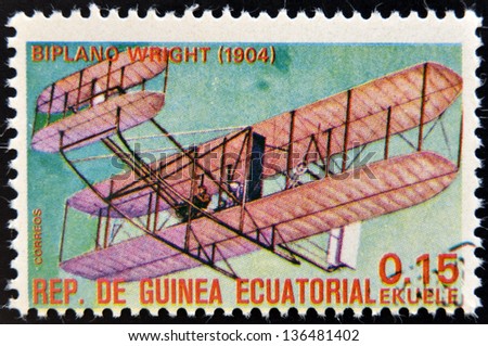 EQUATORIAL GUINEA - CIRCA 1974: A stamp printed in Guinea dedicated to history of aviation shows Wright brothers\' biplane,1904,  circa 1974