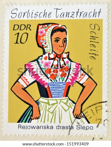 EAST GERMANY- CIRCA 1971: stamp printed in Germany shows Dance Costume, circa 1971.