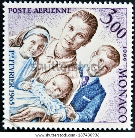 MONACO - CIRCA 1966: a stamp printed in Monaco shows Grace Kelly an her children princess Caroline, prince Albert II and princess Stephanie, circa 1966.