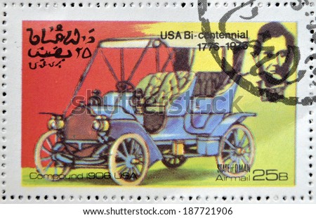 OMAN - CIRCA 1976: A stamp printed in State of Oman shows a american car, compound 1906 usa, circa 1976