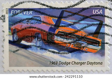 UNITED STATES OF AMERICA - CIRCA 2013: a stamp printed in USA showing an image of a 1969 Dodge Charger Daytona car, circa 2013.