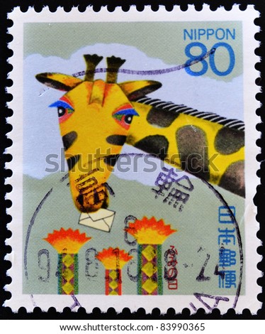 JAPAN - CIRCA 1994: A stamp printed in Japan shows the drawing of a giraffe with an envelope in the mouth, circa 1994