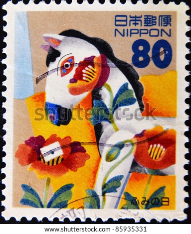 JAPAN - CIRCA 1990: A stamp printed in Japan shows a drawing of a horse with flowers