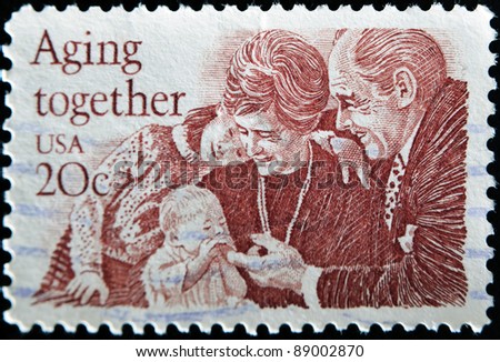 UNITED STATES - CIRCA 1982: A stamp printed in United States, shows peoples with childs, circa 1999