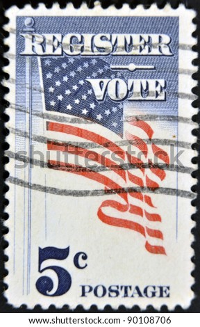 USA - CIRCA 1964 : A stamp printed in the USA shows Register Vote and american flag, circa 1964