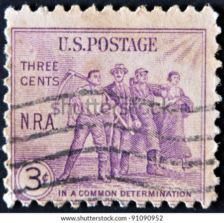 USA - CIRCA 1933 : A stamp printed in the USA shows Workers: National Recovery Act (N.R.A.), In a common determination, circa 1933