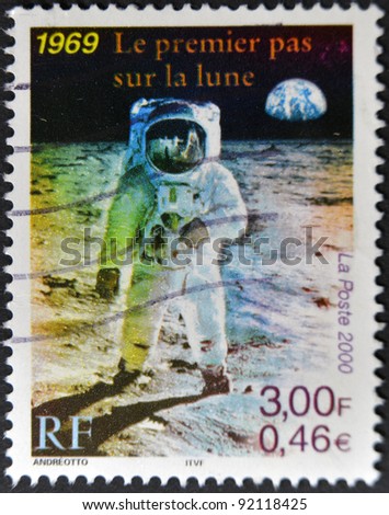 FRANCE - CIRCA 2000: A stamp printed in France shows the first man on the moon, Neil Armstrong, circa 2000